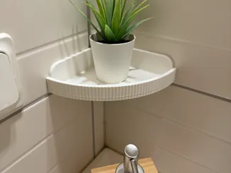 Stylish minimalist corner shelf