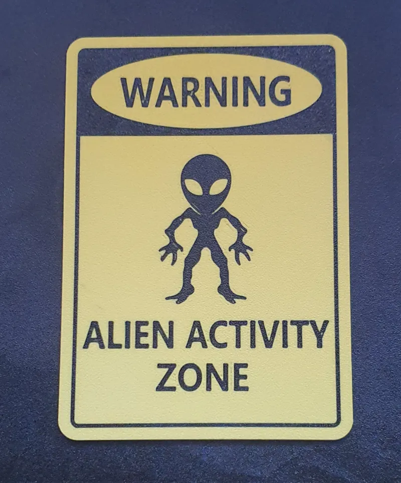 Warning alien activity zone - sign