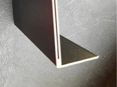 Corner tile for windowsill covering