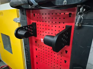 Tool cabinet paper towel holder