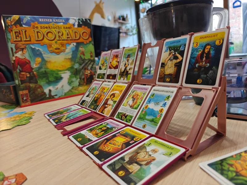 the quest for El Dorado card trays +market display