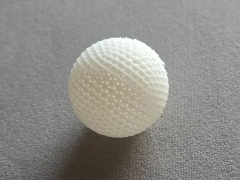 A durable, bouncy ping-pong ball. Hollow inside.