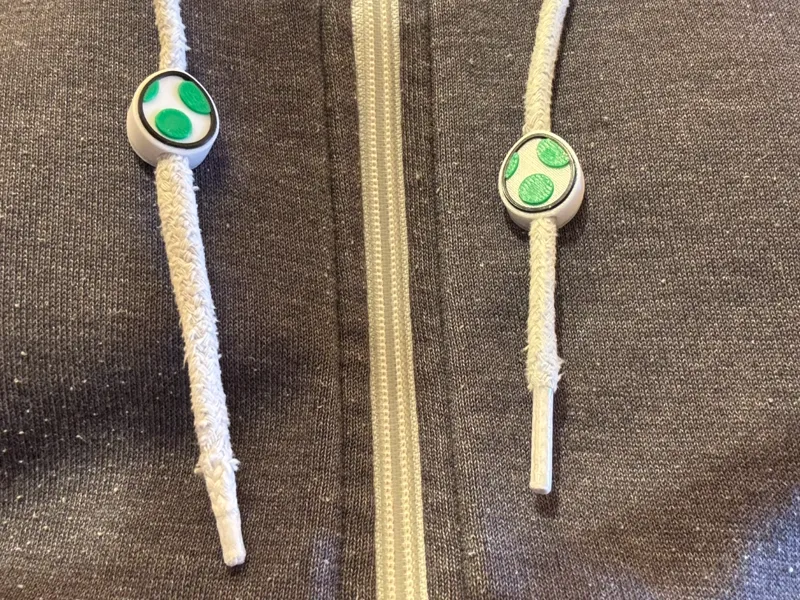 Kapuzenpulli-Kordelstopper Nintendo Yoshi ei