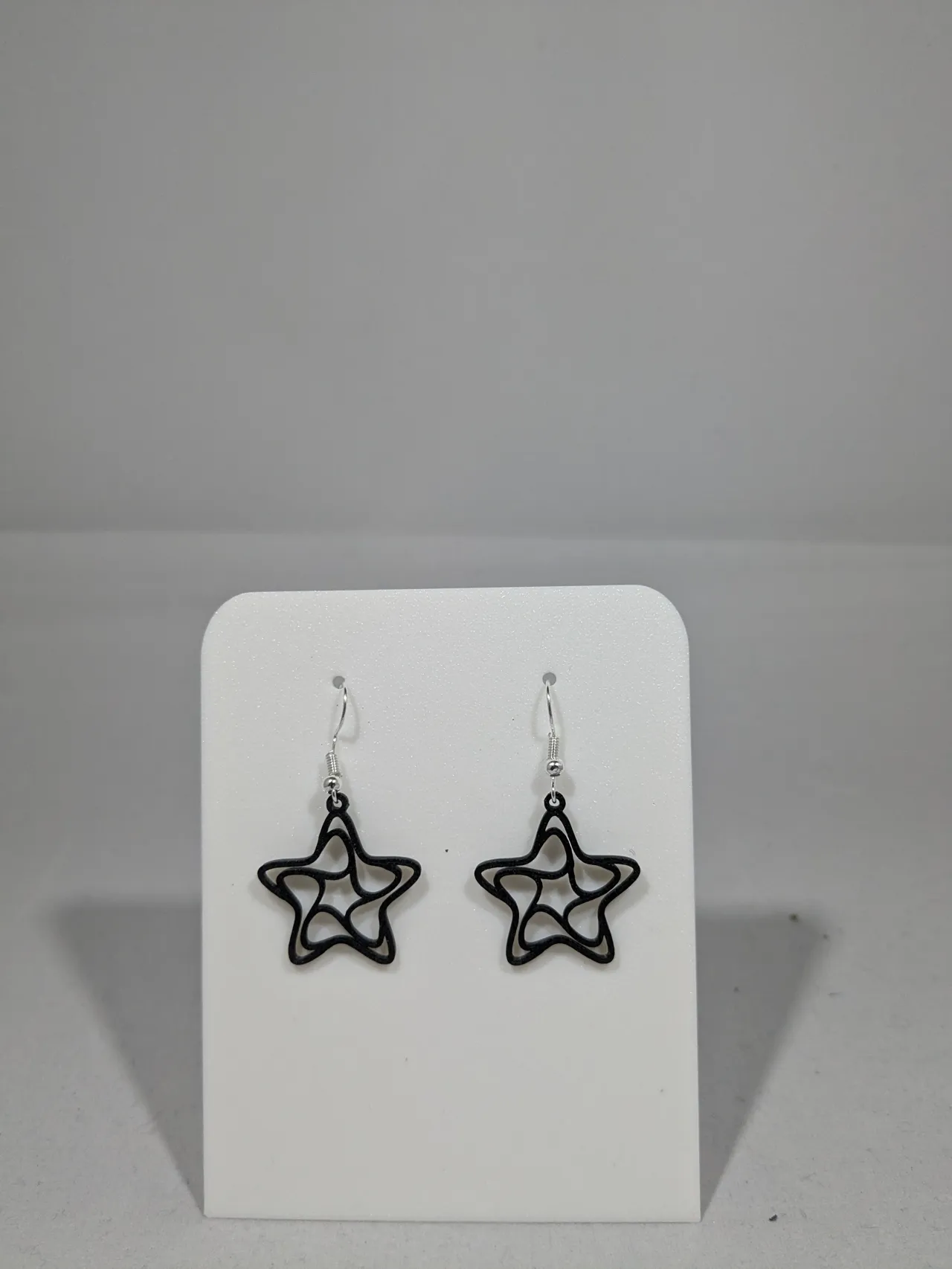 Star with swirl earrings view 3
