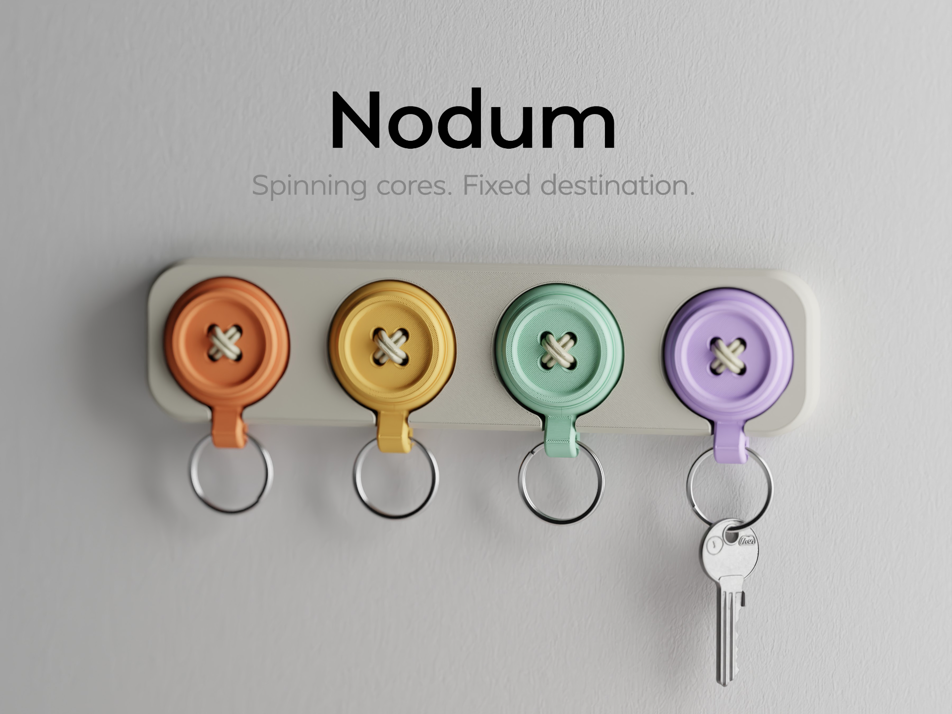 Nodum Keychain–Spinning cores. Fixed destination. 