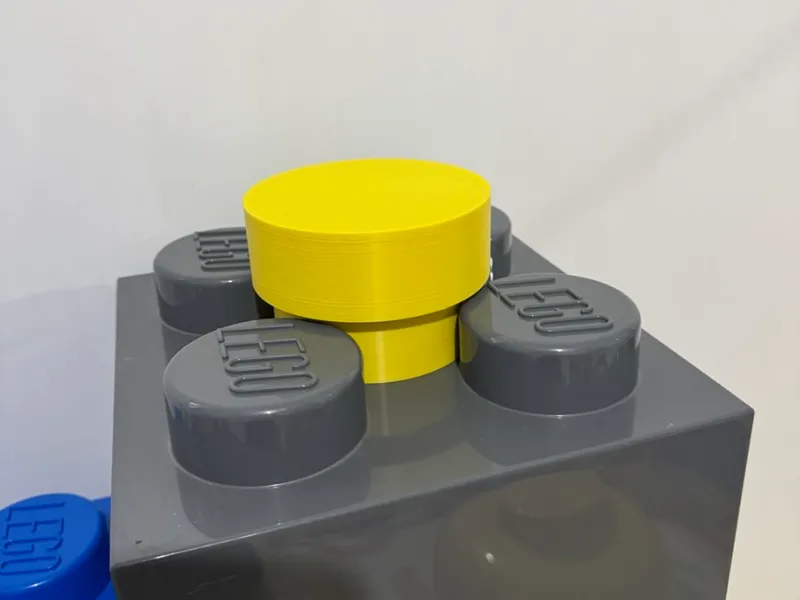 Adaptateur pour tête rangement brique