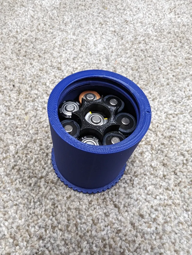 Spool weight AA Battery spacer