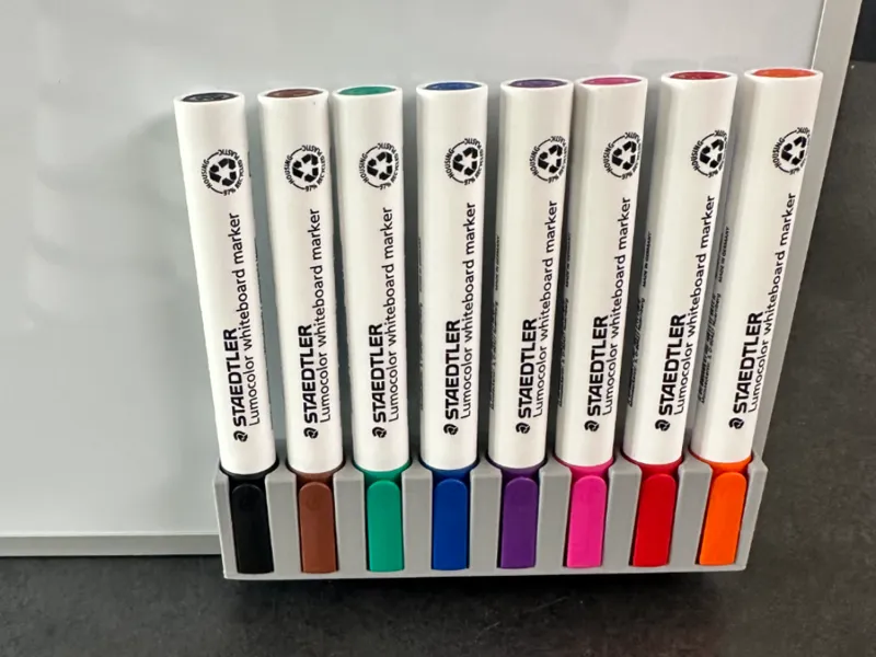 Magnetic whiteboard marker holder