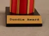Dundie Award base label [0.16mm layer]