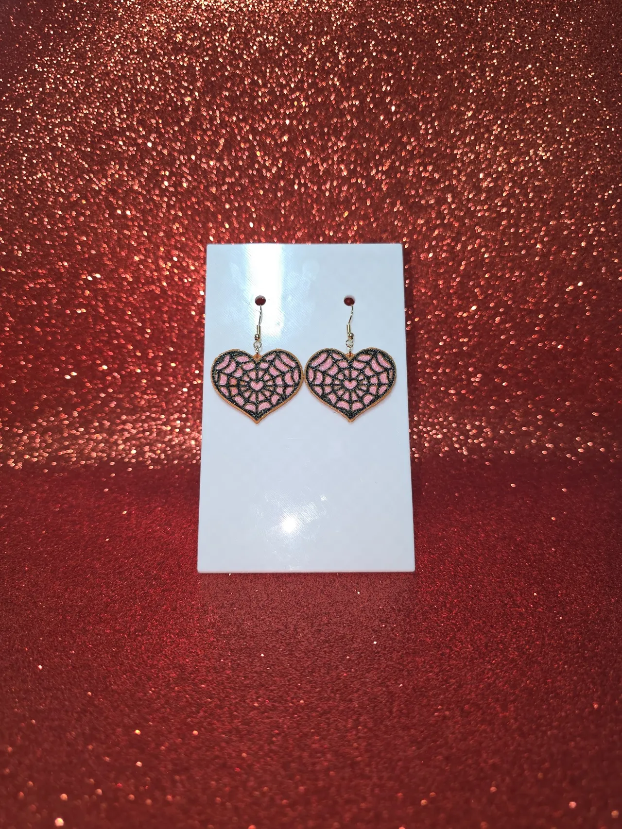Spiderweb heart earrings view 2
