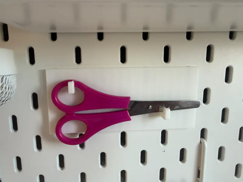 Universal shear holder for balances panel