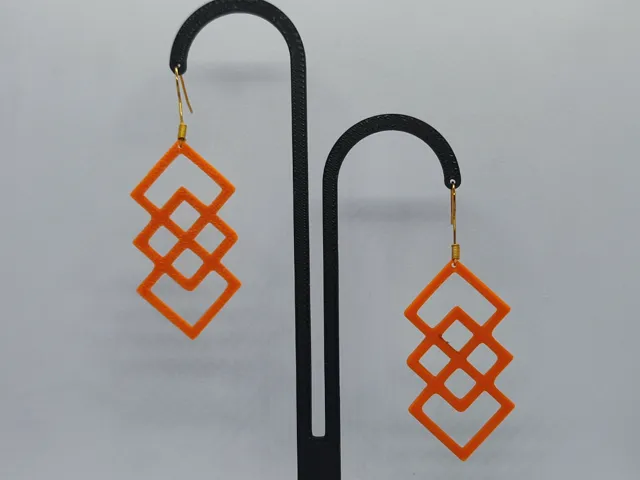 Aretes Diamantes en Movimiento