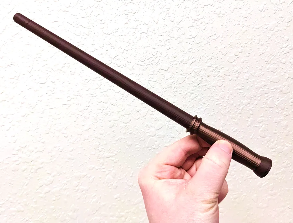 Bacchetta magica dal design speciale che si illumina al buio. Statuetta decorativa regalo