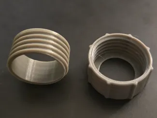 Parametric screw on motor retainer