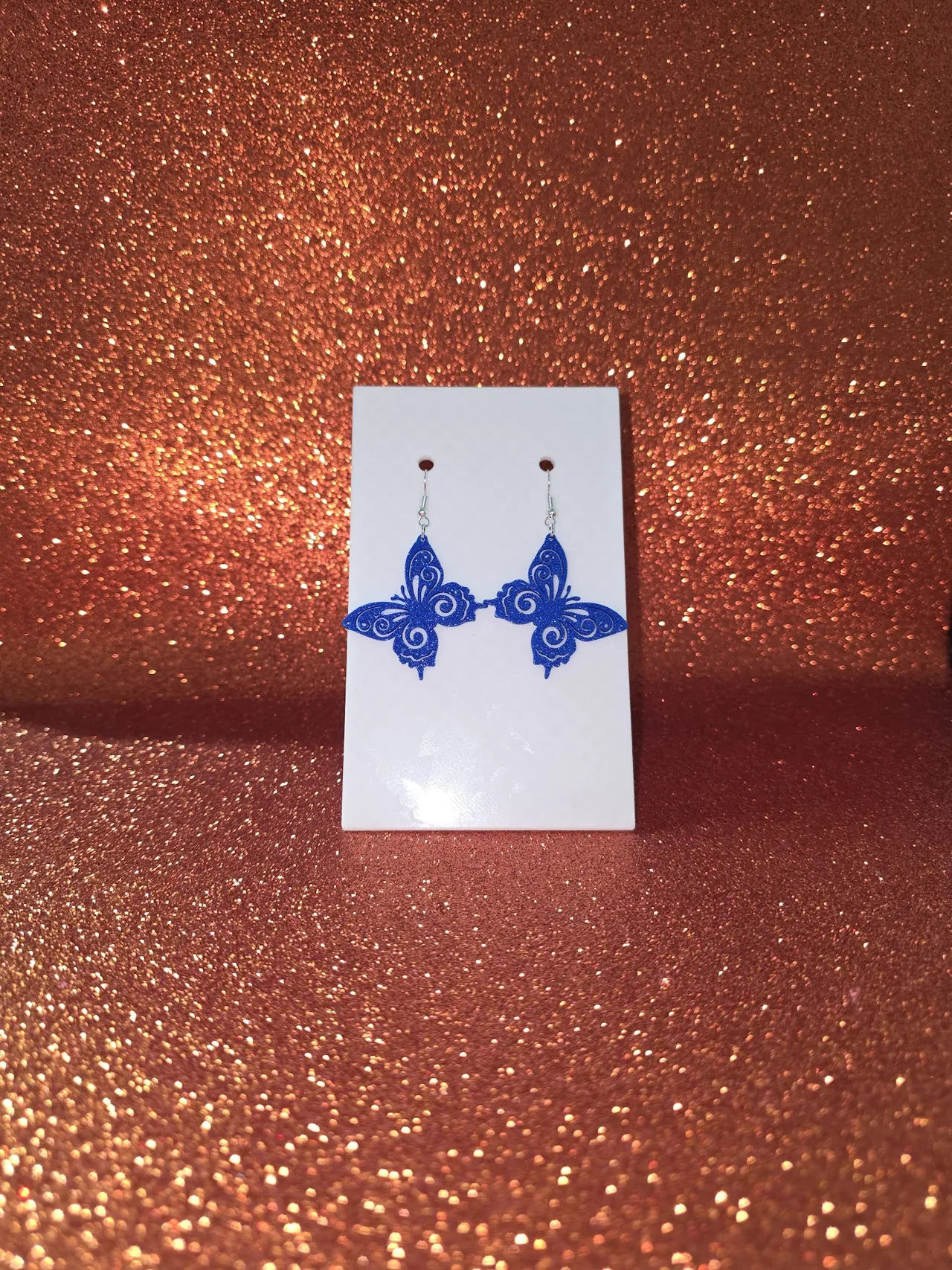 Tribal butterfly earrings view 2
