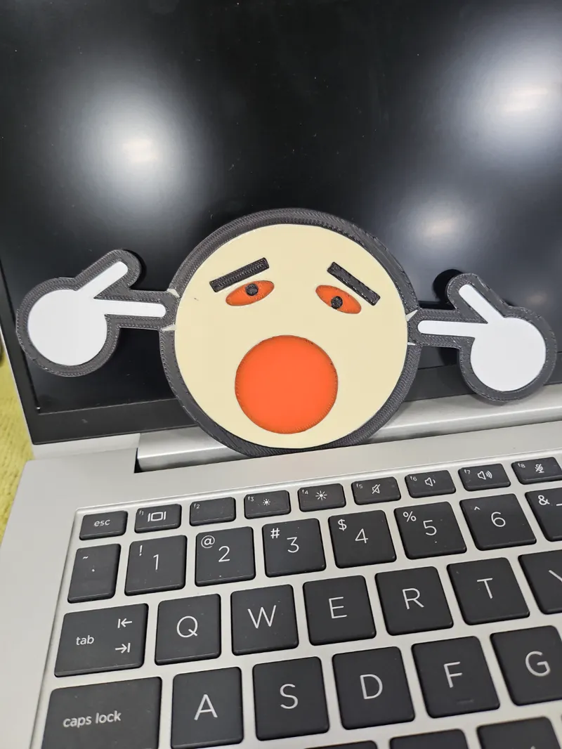 Too loud emoji face keychain