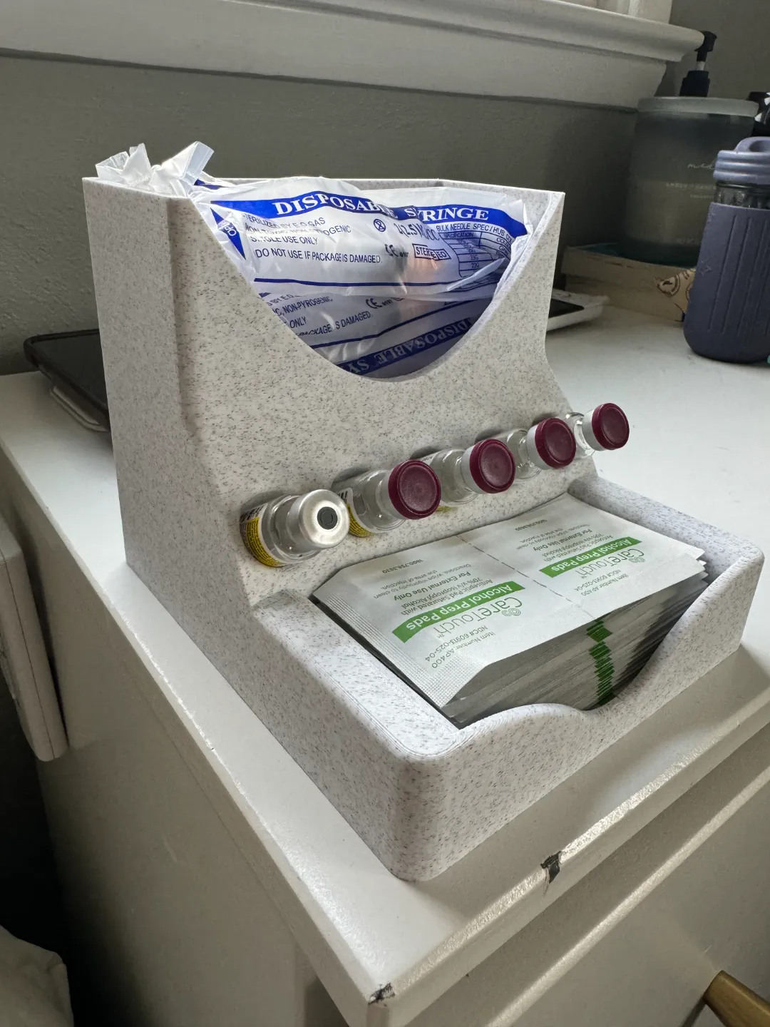 Station de rangement pour flacons