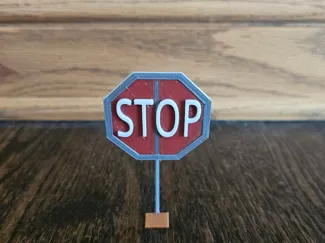 stop sign and traffic cone