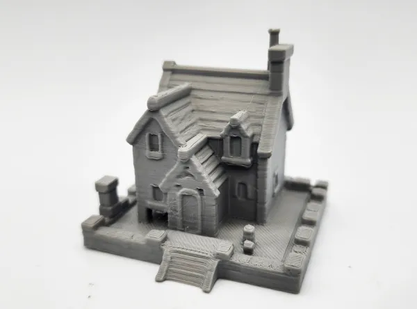 Maison en pierre miniature