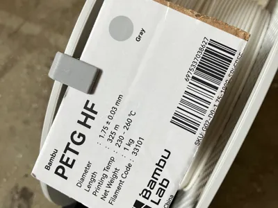 Filament spool clip with information
