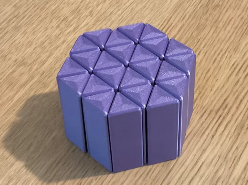 Triangular hexagon sliding fidget toy