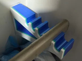 Escuadra para barra de cortina