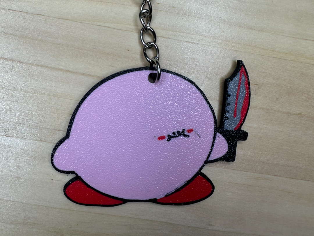 Kirby with a knife keychain
