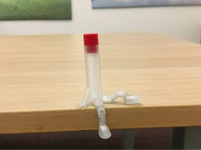 Sitting test tube with flexible legs