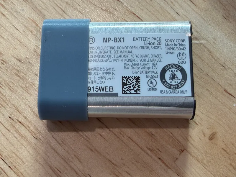 Sony NP-BX1 battery terminal cover