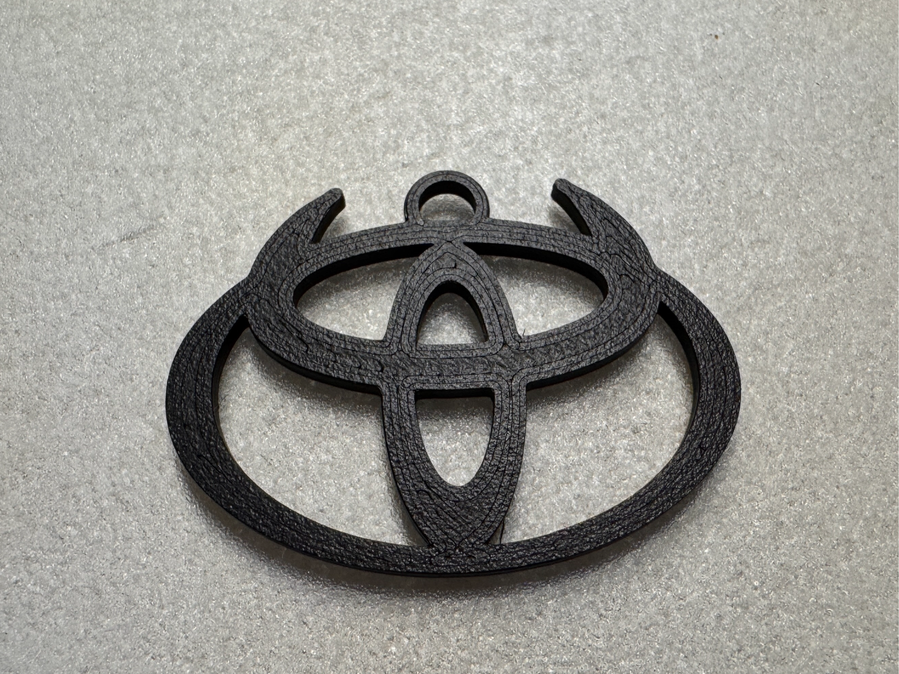 Toyota Hörnchen Logo Schlüsselanhänger
