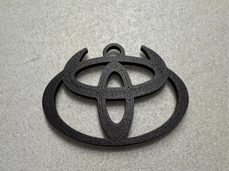 Toyota Hörnchen Logo Schlüsselanhänger