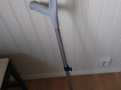 Dog poop bag holder for crutch