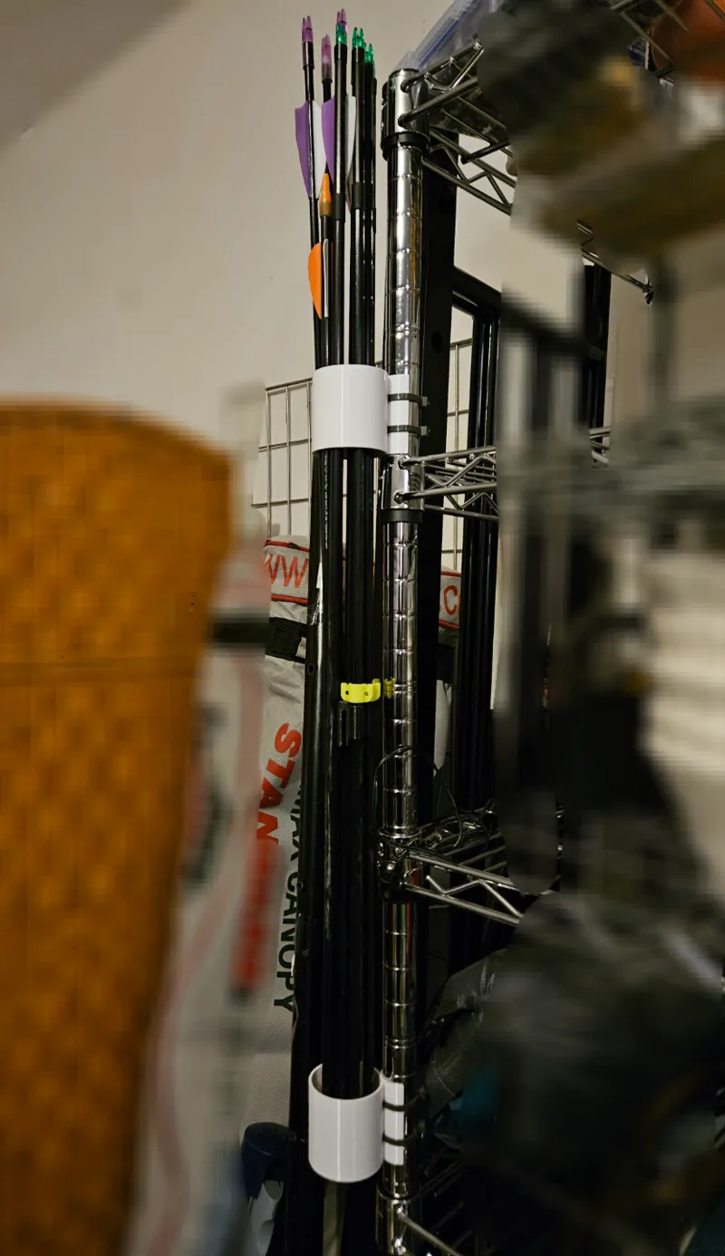 Arrow/Fishing Pole Holder for Wire Racks