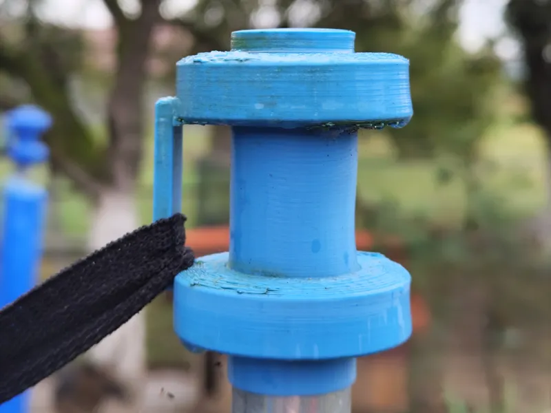 Trampoline net holder