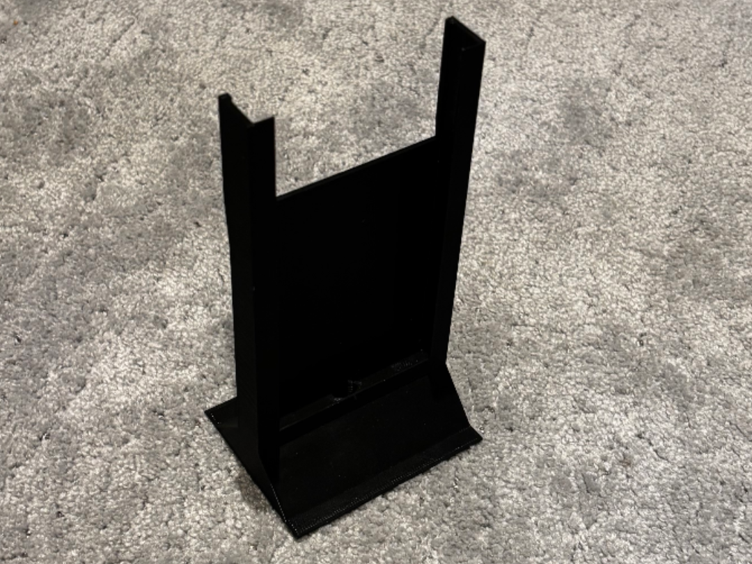 Phone Stand (allows for camera and cord charging)