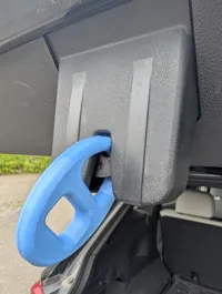 Thicker with larger hole for ratchet strap