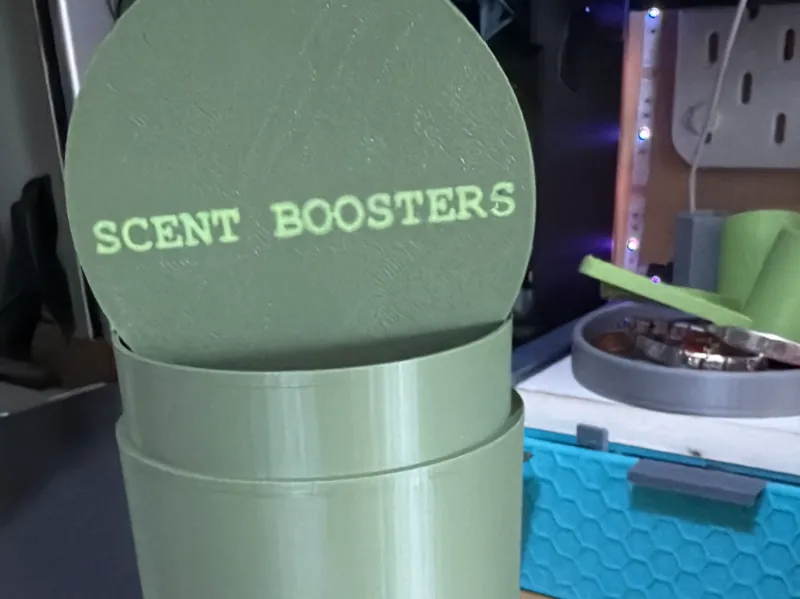 Tub to hold scent boosters for your laundry ,
