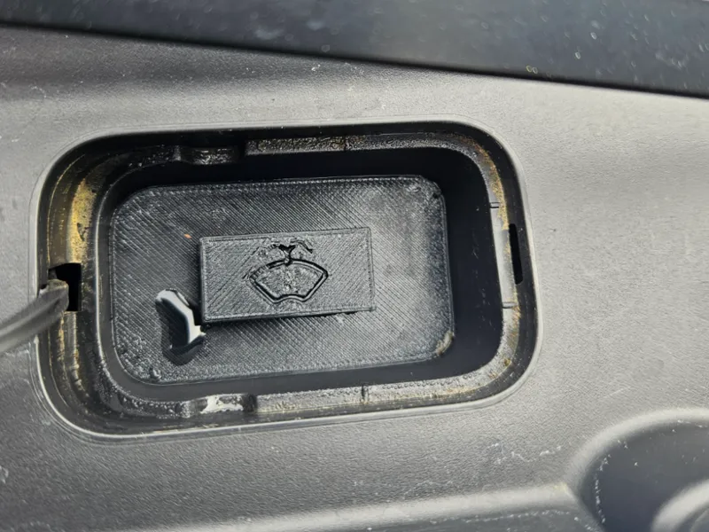 Fisker Ocean wiper fluid filler cap plug
