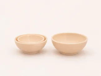 A bowl and tableware suitable for a dollhouse.