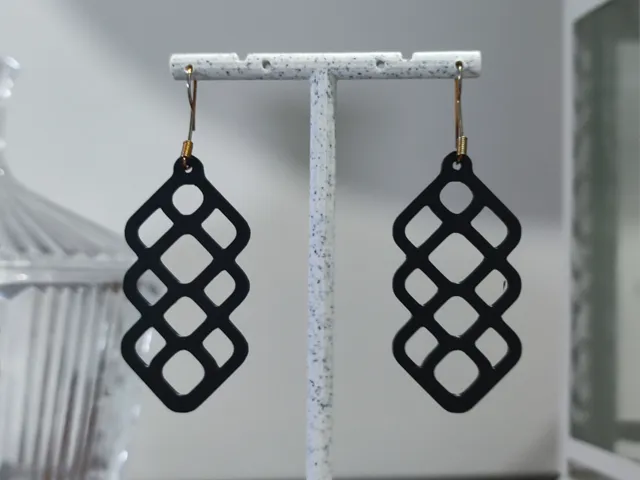Aretes Enigma de Red