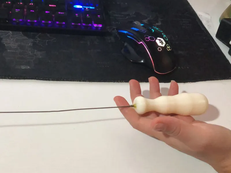 Unblocks clogged nozzle