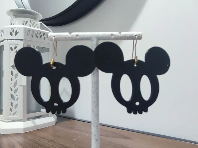 Aretes Sonrisa del Ratón Mortal
