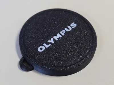 Olympus Trip 35 Lens Cap — Multicolored Logo