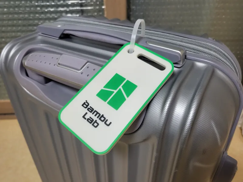 Name plate for travel carrier