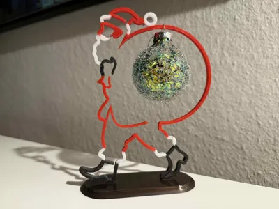 SantaClaus with christmas ball decoration on stand
