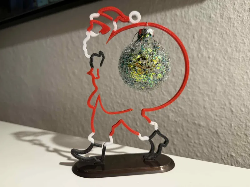 SantaClaus with christmas ball decoration on stand
