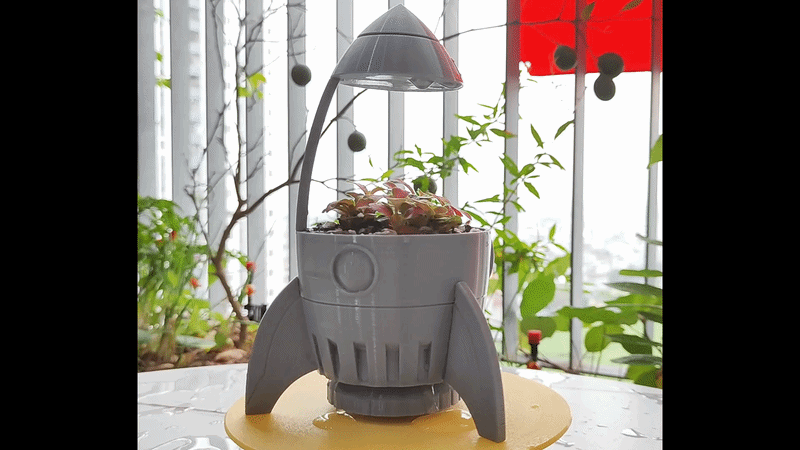 AstraPot: The Kinetic Rain-Rocket Planter 