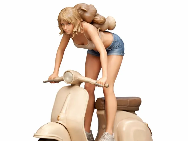 girl riding vespa bike