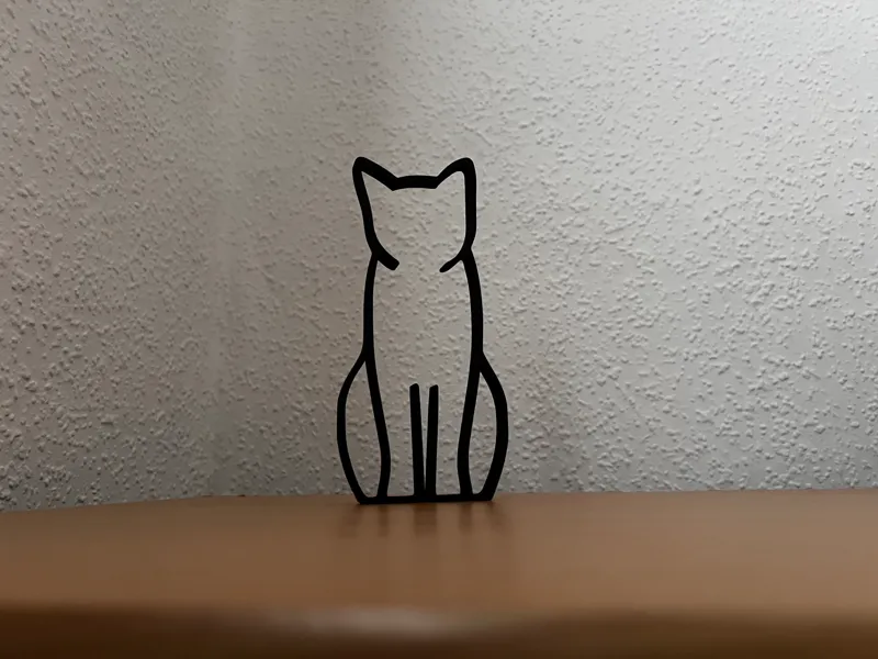 Katzensilhouette sitzend (von vorn)