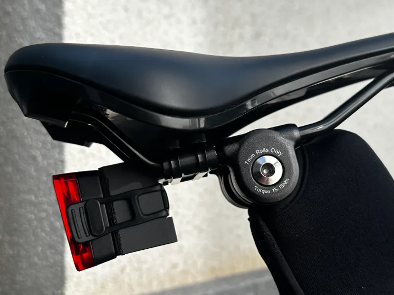 Universal bike light reflector holder at seat